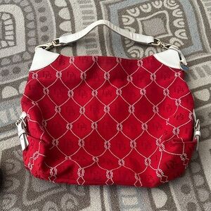 Dooney & Bourke Dillon red canvas hobo bag with a rope pattern